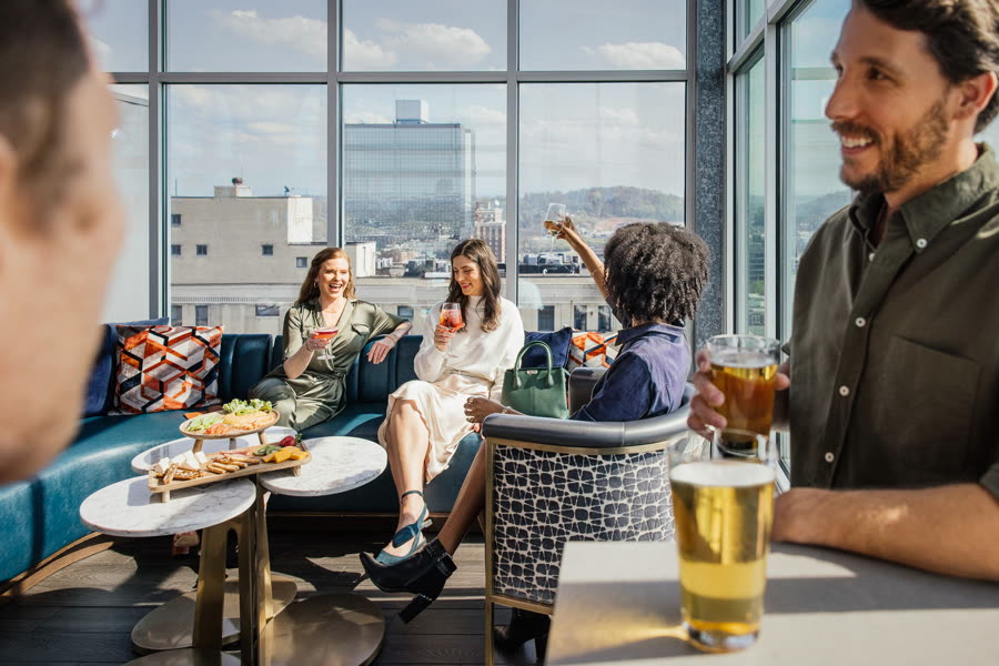 Rooftop lounge at an Embassy Suites hotel, photographed for Hilton